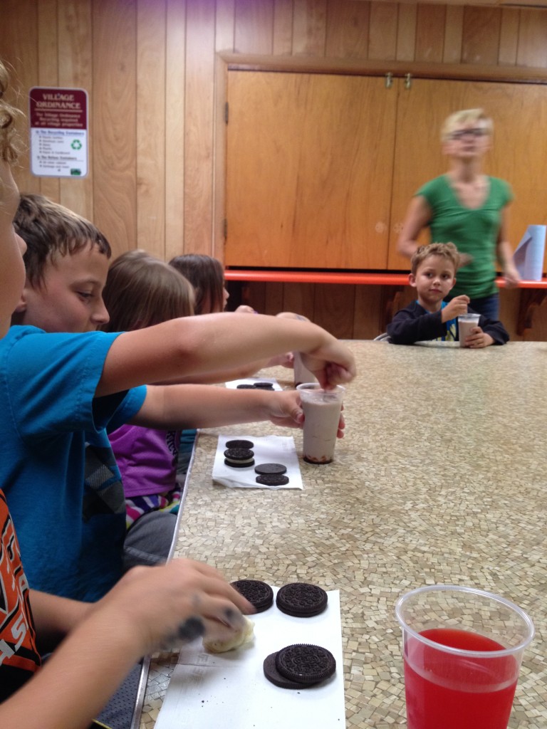 Jayce and Jayden mixing up some chocolate milk at snack time...yum!